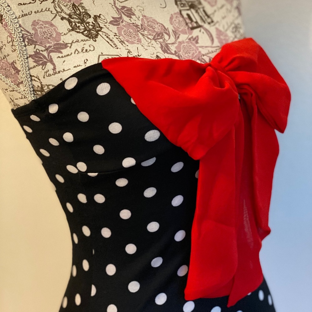 Strapless top black white polka dots red bow